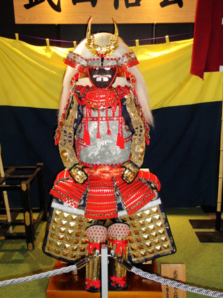 Illustration for article titled Booth Check: The Warlord Armor of TGS